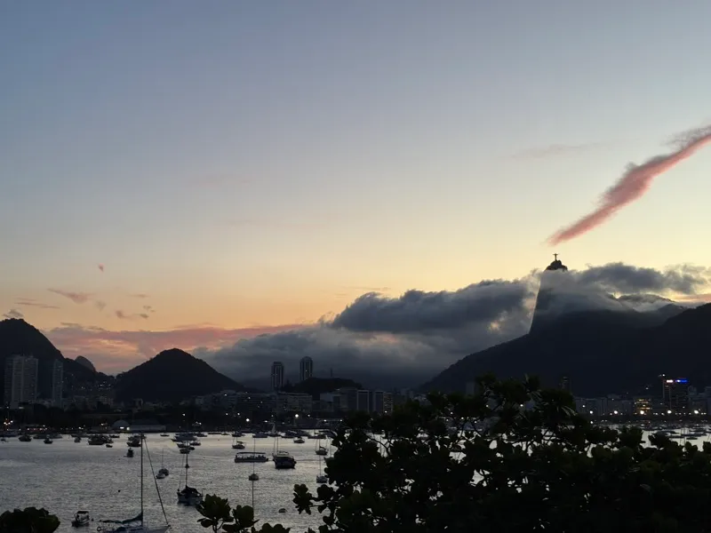 The Corcovado wrapped in cloud at dusk, seen from Urca, Rio de Janeiro